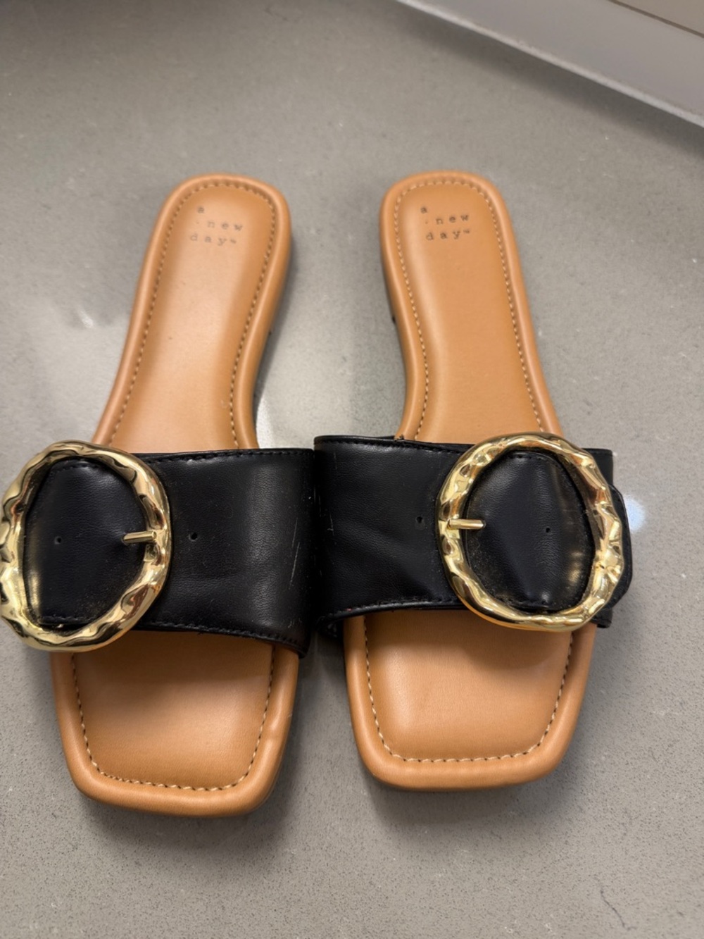a new day Black Slide Mules with Gold Buckle